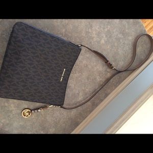 Michael Kors crossover bag - never been used.